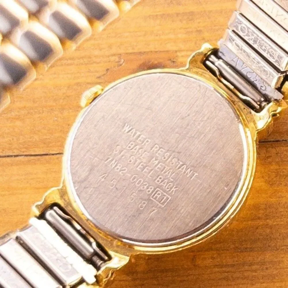 Vintage Seiko 7N82-0038 Ladies Quartz Watch Gold Tone Black Dial Date May 1994